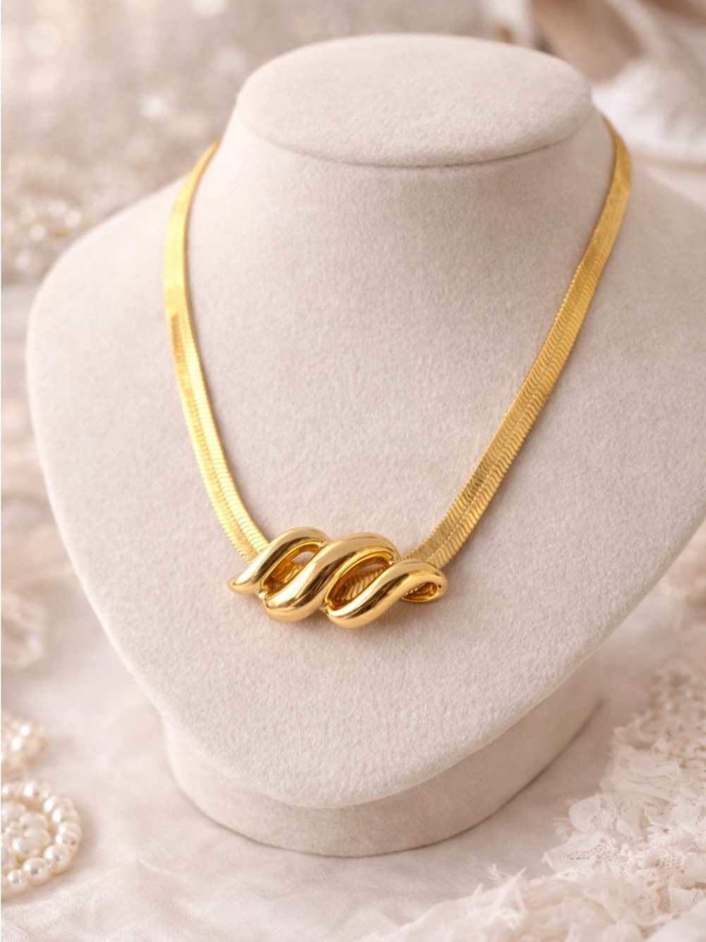 Vintage Gold Tone Herringbone Necklace with Sculptural Swirl Centerpiece
